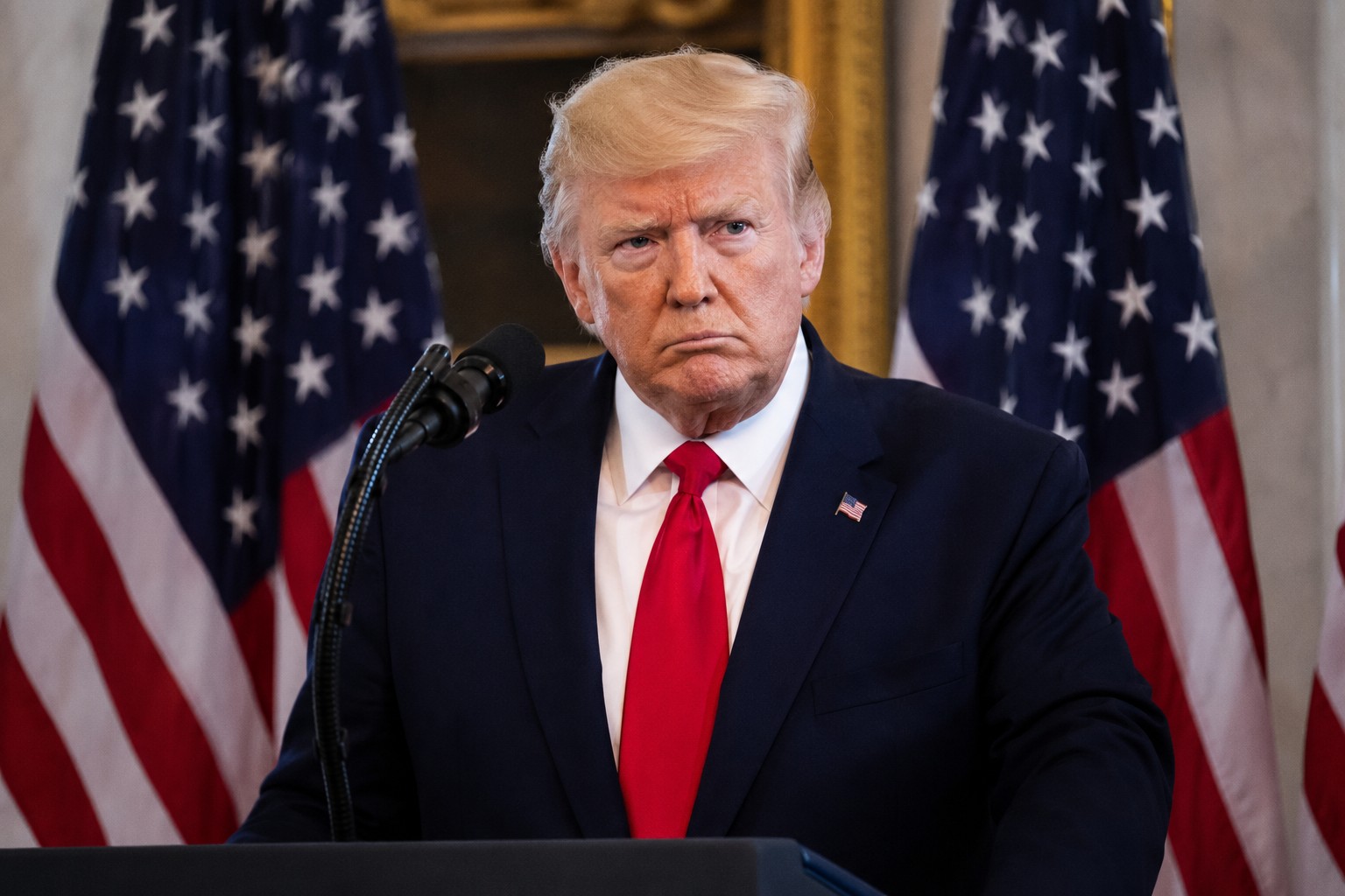 President Donald Trump at a podium